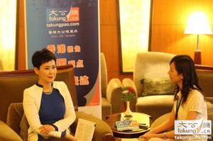 Li Xiaolin (left) in an interview with Ta Kung Pao. (Ta Kung Pao)