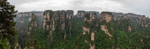 Panorama of the flat-topped, heavily forested mountains of Heavenly Pillar in Zhangjiajie National Forest Park, in northwest Hunan Province. The mountains of Heavenly Pillar reportedly inspired the Hallelujah Mountains in the film “Avatar.”