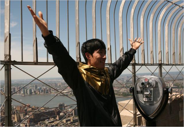 Liu Xiang, the defending Olympic gold medalist in the 110-meter hurdles, at the Empire State Building on Wednesday. (Fred R. Conrad/The New York Times)