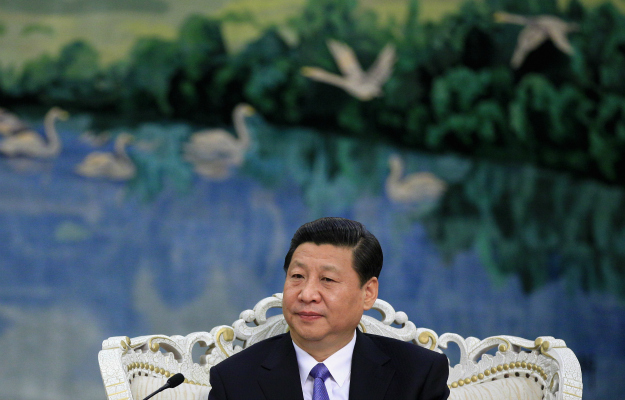 Xi Embraces Mao as He Tightens Grip on Country