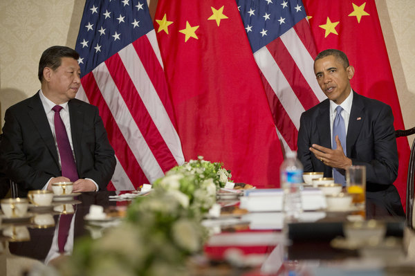 Xi and Obama Meet on Sidelines of Security Summit