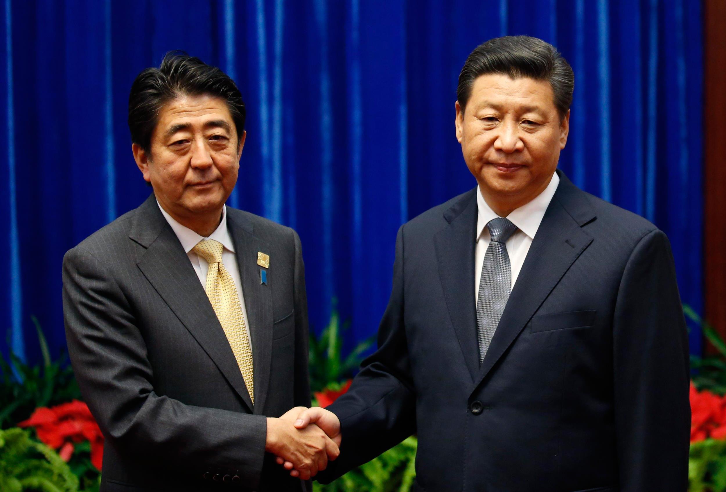 Frosty Meeting Between Xi and Abe Aims To Break Ice