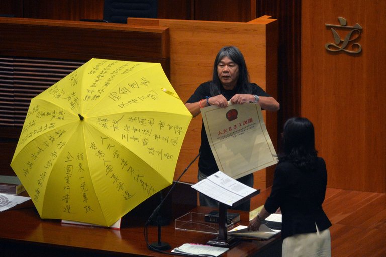 New Hong Kong Legislators Barred After Protesting Oath