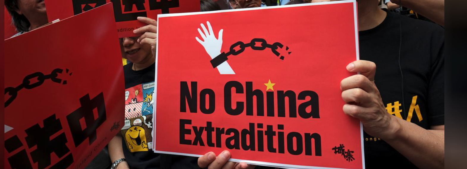 Tens of Thousands Protest New Extradition Rules in HK