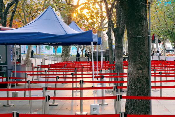 Red barriers mark out a path to queue for COVID testing, but nobody's in line.