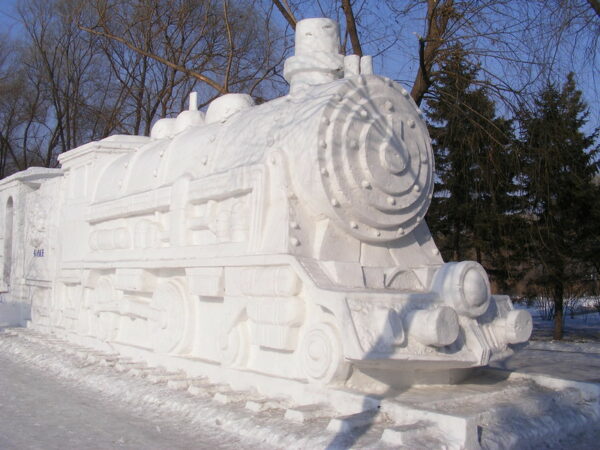 An extraordinarily detailed snow sculpture of an old-fashioned steam train is displayed at the annual Harbin International Ice and Snow Sculpture Festival.