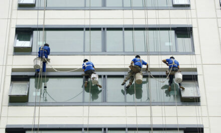 Photo: Untitled (Migrant Workers Washing Windows in Beijing), by Crozet M. / ILO